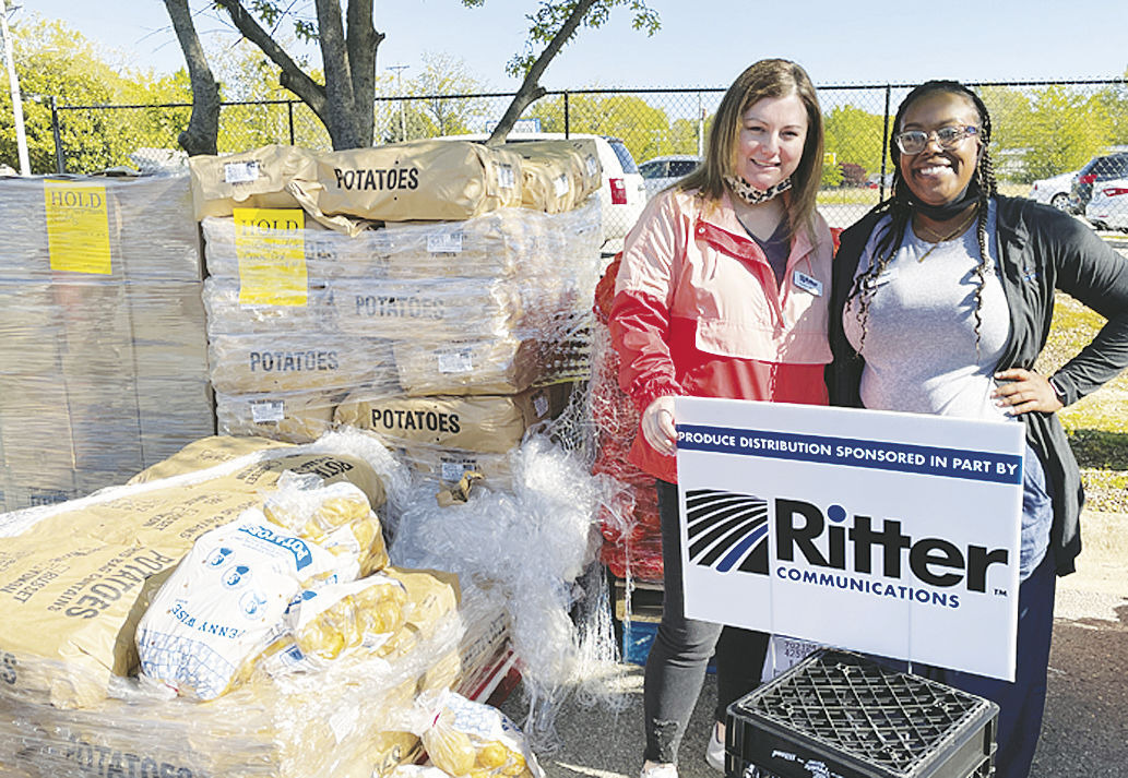 Ritter volunteers distribute food